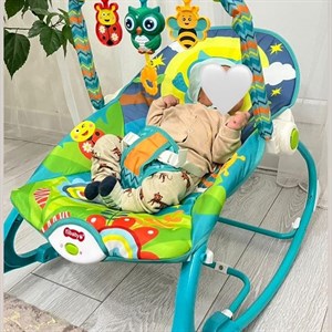 Детское кресло качалка шезлонг с музыкой и игрушками