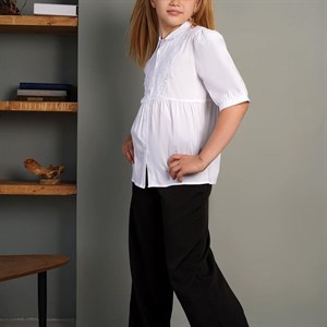 Модные и элегантные школьные блузки в новой коллекции